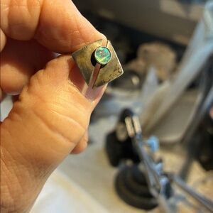 Sterling (marked) silver earrings with small circle of iridescent abalone